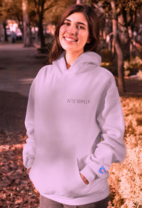 model standing wearing rose colour  hoodie