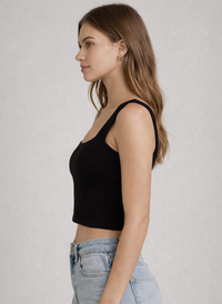 Woman wearing a black tank top and light blue jeans, shown from front and back on a plain background.