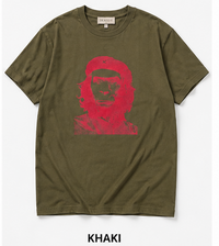 Khaki t-shirt with red graphic of a face on a white background