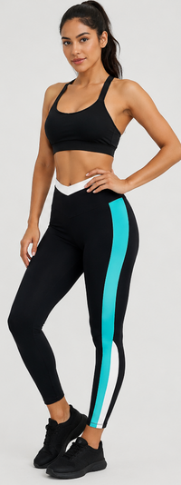 Woman wearing black sports bra and leggings with turquoise stripe on a white background