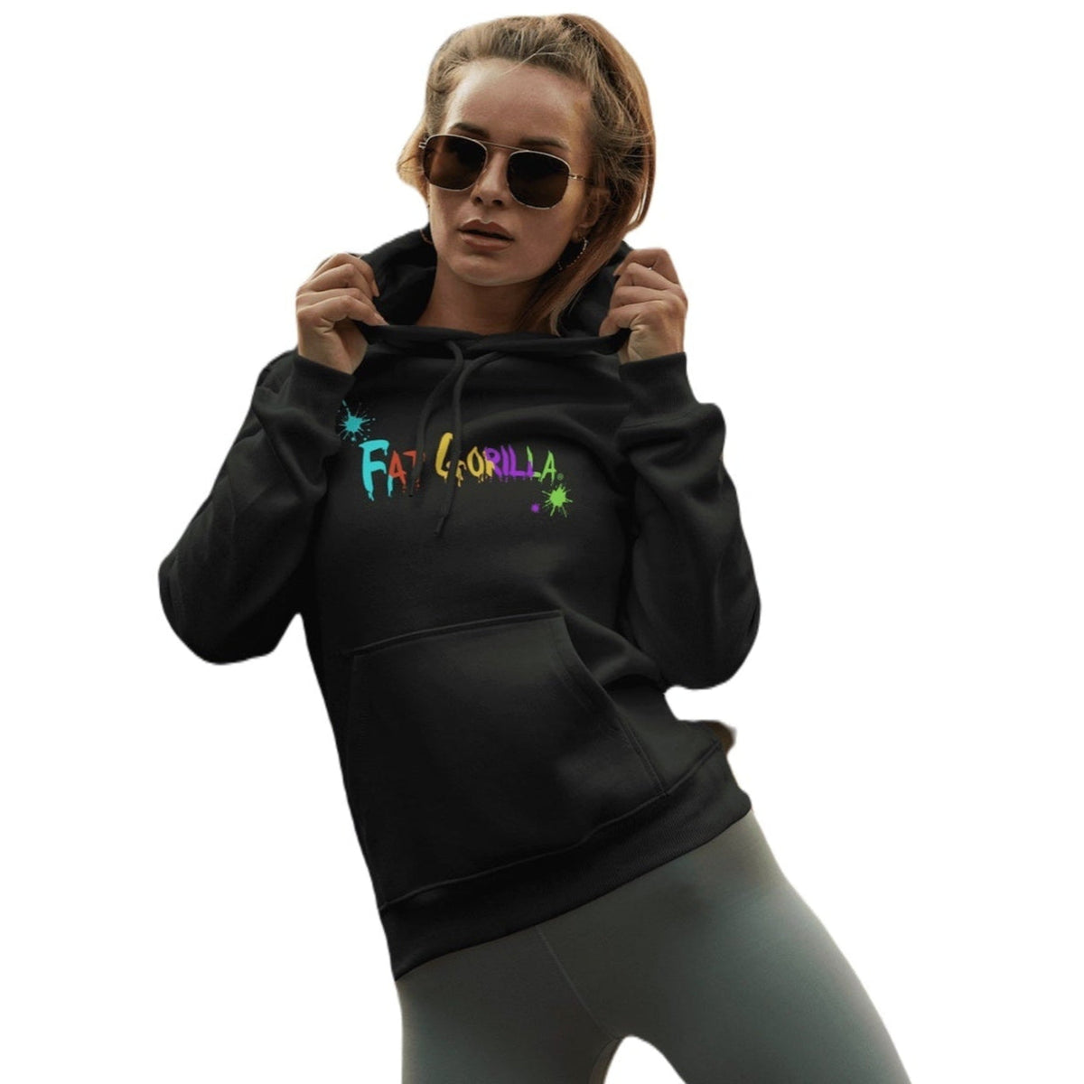 Person wearing a black hoodie with colorful text on a white background